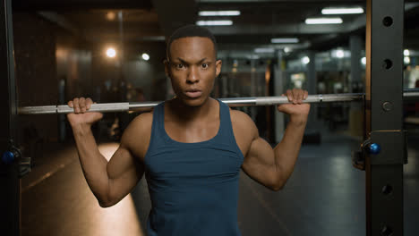 Close-up-view-of-an-athletic-african-american-man-in-the-gym.