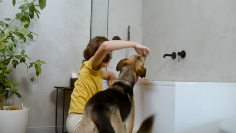 Girl-and-dog-at-the-bathroom