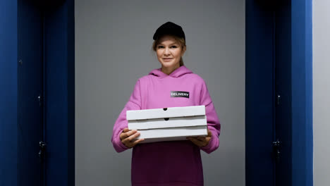 Woman-holding-food-boxes