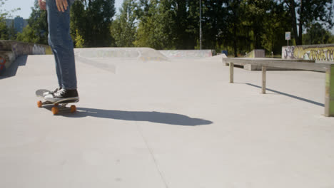 Boy's-feet-on-skateboard-in-skatepark.