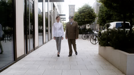 Man-and-woman-walking-on-the-street