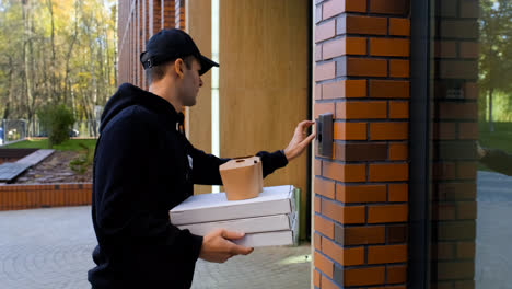 Delivery-man-ringing-on-the-entrance