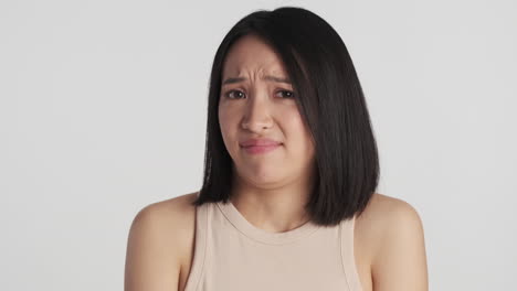 Asian-woman-feeling-disgusted-on-camera.