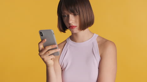 Unhappy-woman-watching-sad-video-on-smartphone