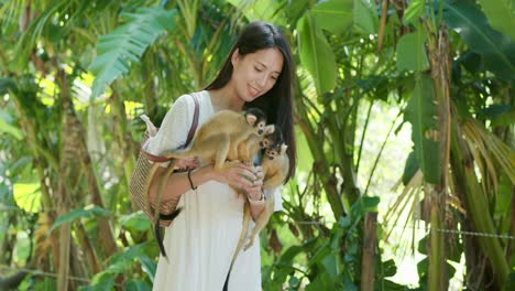 Woman-and-Squirrel-Monkeys