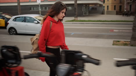 Young-girl-walking-through-the-street