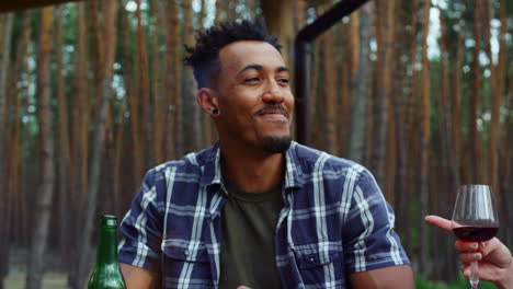 Afro-guy-laughing-on-bbq-party