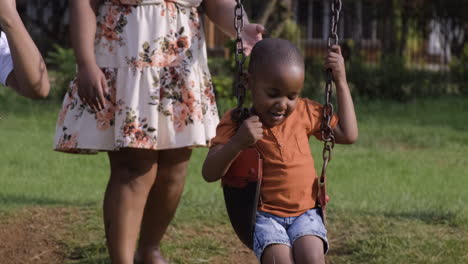 Child--playing-on-the-swings