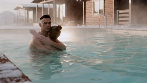 Couple-hugging-inside-a-pool