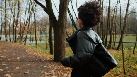 Young-woman-running-at-the-park