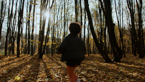 Young-woman-running-at-the-park