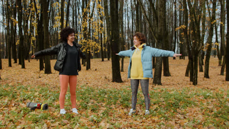 Two-women-stretching-outdoors