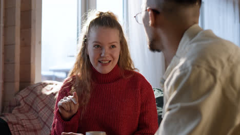 Young-couple-talking-at-home