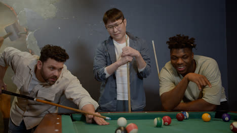 Happy-men-playing-snooker