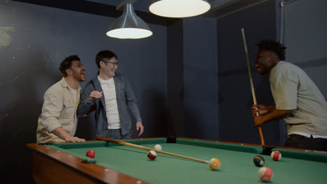 Happy-men-playing-snooker