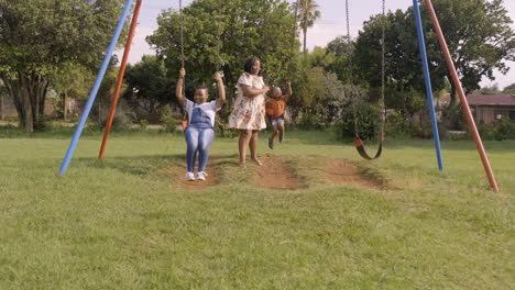 Children-playing-on-the-swings