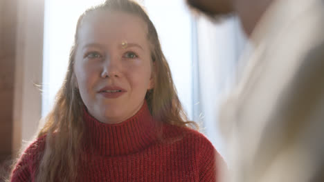 Young-couple-talking-at-home