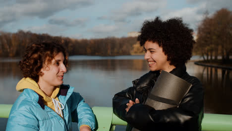 Girls-talking-outdoors