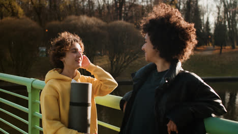 Girls-talking-outdoors