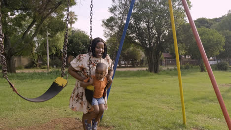 Child--playing-on-the-swings