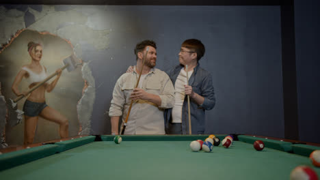 Happy-men-playing-snooker