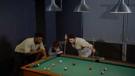 Happy-men-playing-snooker