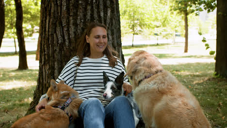 Woman-with-her-pets-outdoors