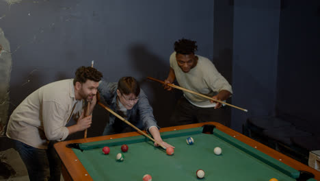 Happy-men-playing-snooker