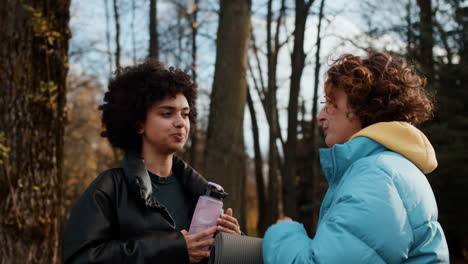 Girls-talking-outdoors