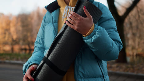 Person-with-yoga-mat