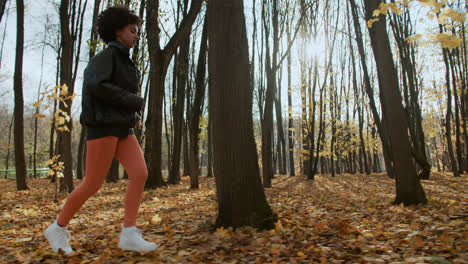 Young-woman-running-at-the-park