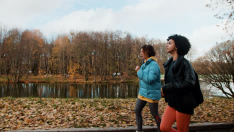 Side-view-of-woman-jogging-outdoors