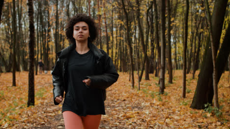 Young-woman-running-at-the-park