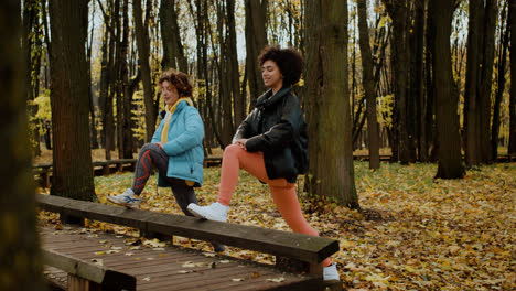 Two-women-stretching-outdoors