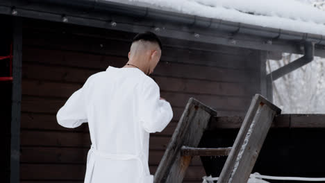 Young-man-going-into-the-hot-tub