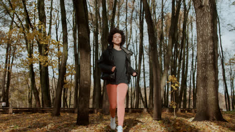 Young-woman-running-at-the-park