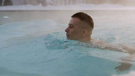 Man-swimming-at-the-pool