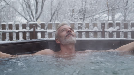 Man-enjoying-bubbles-outdoors