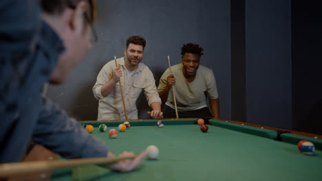 Happy-men-playing-snooker