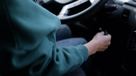 Young-woman-starting-the-truck