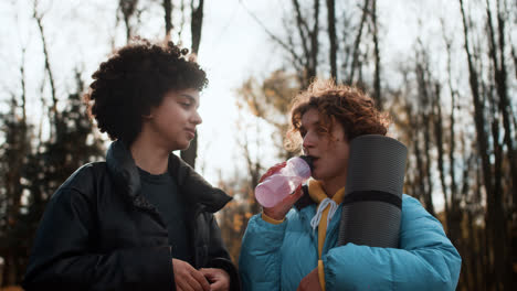 Girls-talking-outdoors