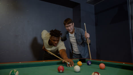 Happy-men-playing-snooker