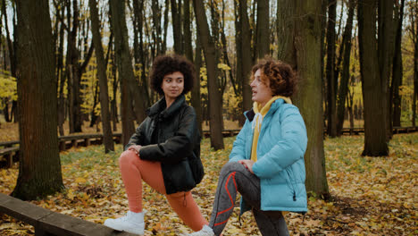 Two-women-stretching-outdoors