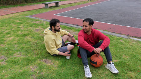 Men-sitting-on-the-grass