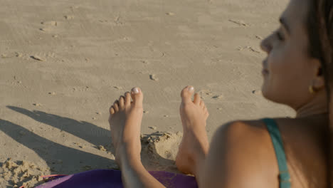 Feet-of-a-person-on-the-sand