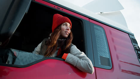 Young-woman-inside-of-a-truck