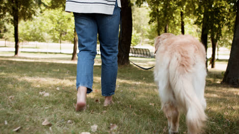 Woman-walking-with-her-dog