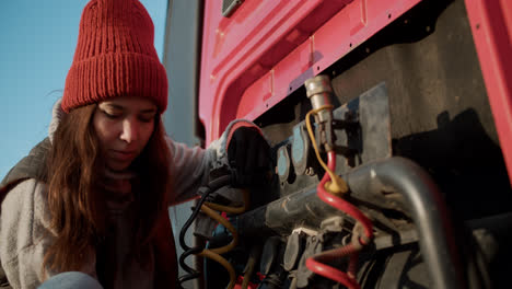 Caucasian-driver-inspecting-the-vehicle