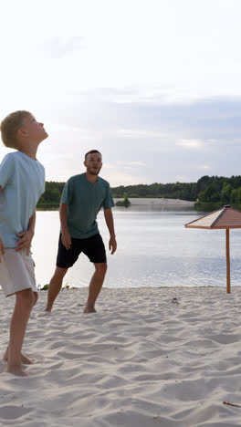 Father-and-sons-playing-on-the-beach