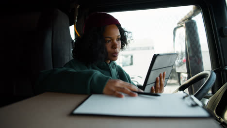 Happy-woman-working-inside-a-truck